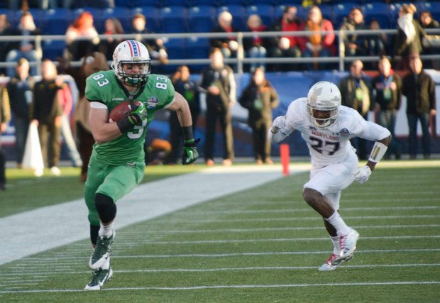 Maryland wide receiver Malcolm Culmer runs for a long gain in the first quarter of the 2013 Military Bowl on Friday, Dec. 27 at Jack Stephens Field at Navy-Marine Corps Memorial Stadium in Annapolis. The Marshall Thundering Herd defeated the Terrapins, 31-20.