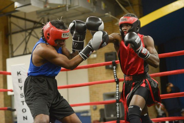 Charles Brumfield (right) tries to land a right hand against Jesse Singletary during a sparring session at the District Heights Classic, an annual amateur boxing event, at the District Heights Municipal Center on Saturday, Jan. 4.