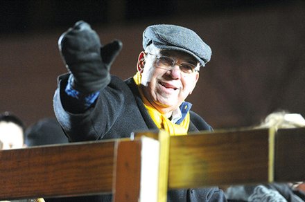 Mayor Thomas M. Menino greets the crowds along Boylston Street that were gathered to see the 2014 First Night procession. Menino’s final term in office ended Monday.