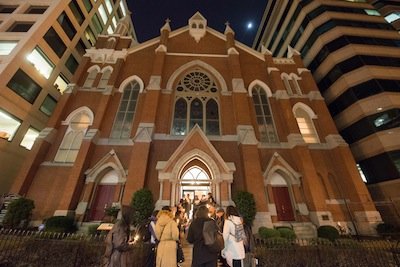 People gather for a candlelight vigil outside the Metropolitan A.M.E. Church in Northwest D.C. after the National Action Network-sponsored National Youth Day of Action Against Gun Violence summit on Wednesday, Jan. 8.