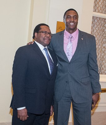 Ralph Everett (left), president and chief executive officer of the Joint Center for Political and Economic Studies with a guest attending the National Action Network King Day Breakfast at the Mayflower Hotel in Northwest on Monday, Jan. 20.