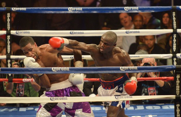 Junior welterweight champion Lamont Peterson dodges Dierry Jean punch in the 12th round on Saturday, January 25 at the D.C. Armory with over 5,550 in attendance. Peterson won the 12 round bout by way of decision.