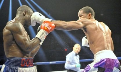 Lamont Peterson (purple trunks) won a unanimous decision over Dierry Jean to retain his IBF junior welterweight title at the D.C. Armory on Jan. 25.