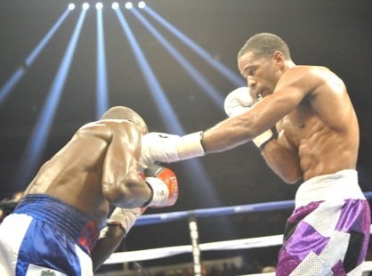 Lamont Peterson (purple trunks) won a unanimous decision over Dierry Jean to retain his IBF junior welterweight title at the D.C. Armory on Jan. 25.