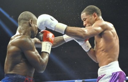Lamont Peterson (purple trunks) won a unanimous decision over Dierry Jean to retain his IBF junior welterweight title at the D.C. Armory on Jan. 25.
