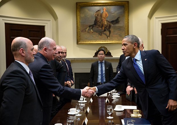 President Barack Obama greets Speaker Osama al-Nujaifi, of the Iraqi Council of Representatives, after he drops by Vice President Joe Biden’s meeting with al-Nujaifi in the Roosevelt Room of the White House on Jan. 22.