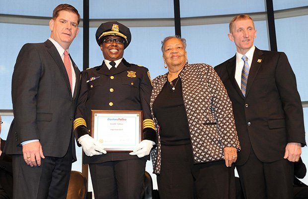 Mayor Martin J. Walsh and Commissioner William Evans swear in Superintendent Lisa Holmes during the Boston Police Department Command Staff appointment ceremony at the JFK Library in Dorchester.