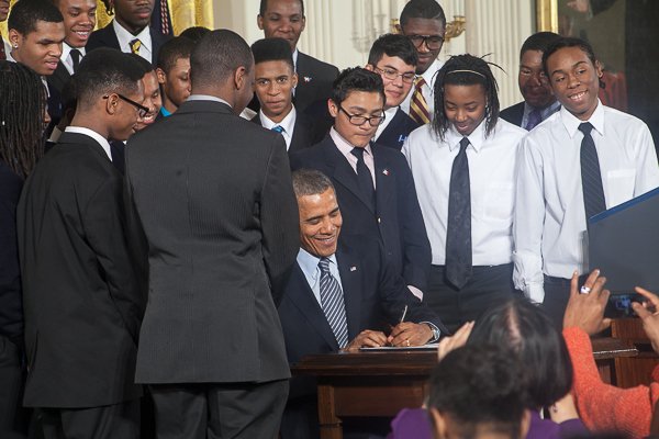 President Obama signs the Presidential Memorandum on his "My Brother's Keeper" initiative at the White House on Feb. 27.