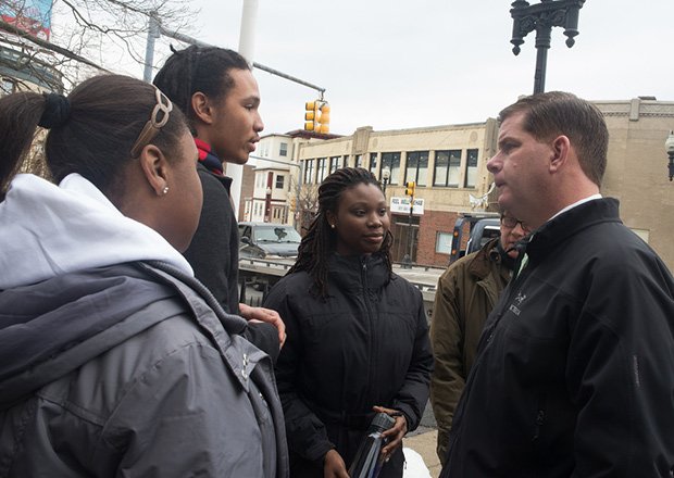 Boston Mayor Martin Walsh visits the Codman Square Farmers Market. Now in its seventh year, the farmers market was organized by the Codman Square Health Council to promote healthy food options in the community.