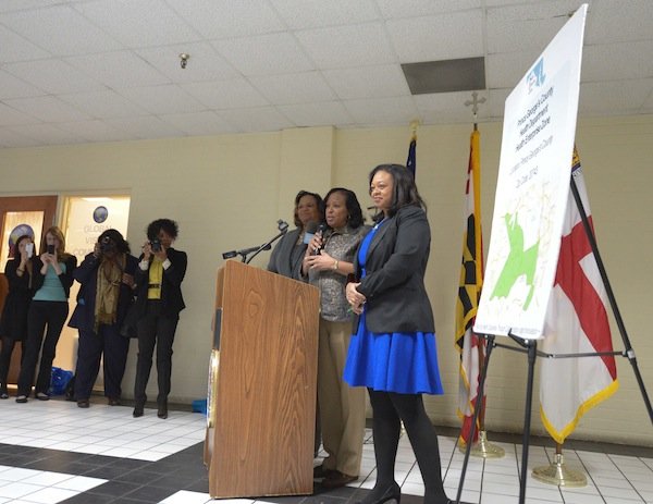From left: Prince George's County Council members Ingrid Turner (D-District 4), Andrea C. Harrison (D-District 5) and Karen Toles (D-District 7) speak about Global Vision Community Health Center founder Toyin Opesanmi during the grand opening of the health center in Capitol Heights, Md., on Thursday, March 6.