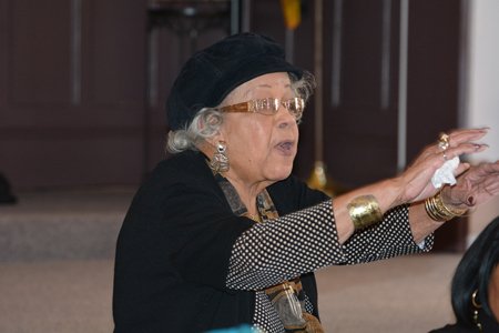 Beatrice “Miss Bea” Smith speaks to a group of students from France who were in attendance.