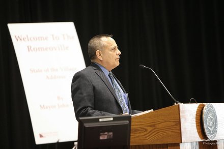 Citgo's Armando "Dino" Arias, chairman of the Romeoville Area Chamber of Commerce introduced Romeoville Mayor John Noak at the mayor's State of the Village Address.