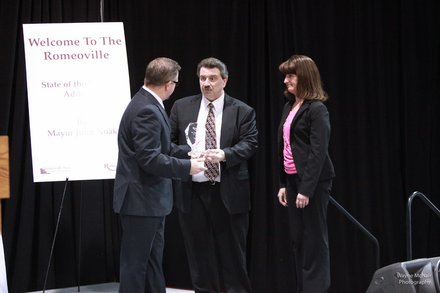 Sam's Club received the New Business of the Year Award from Romeoville Mayor John Noak at the State of the Village luncheon.