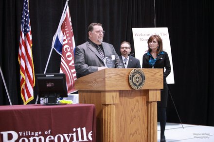 Brunswick Zone in Romeoville received the Small Business Award from Mayor John Noak at Thursday's State of the Village Address. Tom Sorfleet, general manager of Brunswick Zone, accepted the award and gave a short speech.