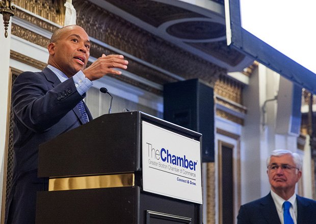 Governor Deval Patrick discusses how Massachusetts is competing on the international playing field at a business summit with Massport and the Greater Boston Chamber of Commerce at the Fairmont Copley Plaza Hotel. Also pictured is Paul Guzzi, president and chief executive officer of the Chamber.