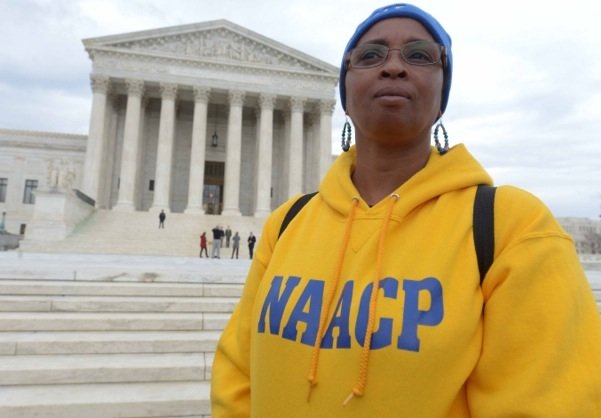 Tisda Campbell of Athens, Ala., stands in front of the U.S. Supreme Court building in D.C. on Wednesday, March 12 during a rally for voting rights.
