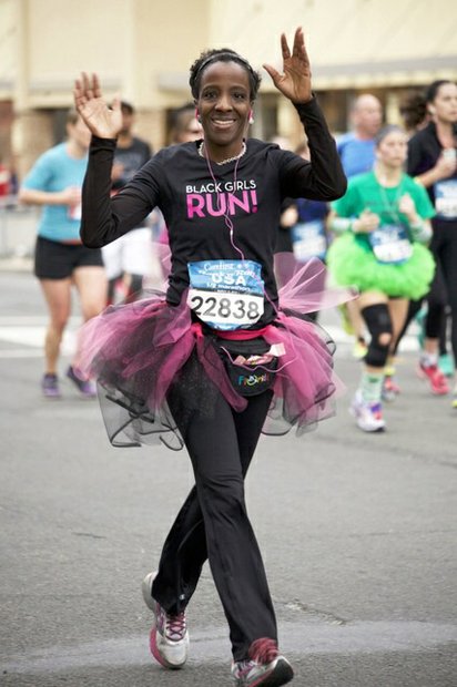 Conya Bailey of Pikesville, Md., passes the midpoint of the D.C. Rock 'n' Roll Marathon in Northwest on March 15, 2014. Bailey represented Black Girls Run!, an organization launched five years ago by a group of women to encourage health and fitness for African-American women through running.