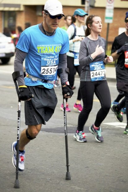 Larry Chloupek of Herndon, Va., participates in the D.C. Rock 'n' Roll Marathon in Northwest on March 15, 2014. Chloupek represented Team 413, a faith-based organization that inspires people through running.