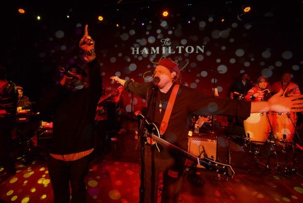 Hip-hop artist Head-Roc (left) performs with D.C.-based afrofunk band Chopteeth at the Hamilton in Northwest on Friday, March 14.