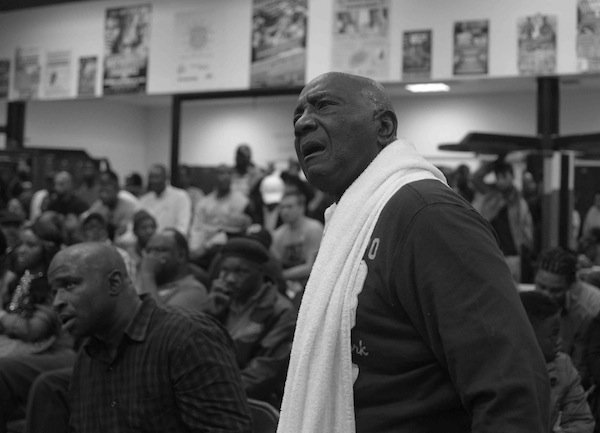 Legendary boxing coach Abraham "Ham" Johnson watches his fighter Christopher Perkins (Woodland Gym) during a semifinals bout in the 2014 Washington Golden Gloves championship tournament at the Sugar Ray Leonard Boxing Center in Palmer Park, Md., on March 15. Perkins lost to Shynggskhan Tazhibay (Raw Assassin Gym).