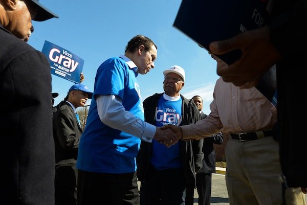 D.C. Mayor Vincent Gray speaks with constituents April 1, the day of the Democratic primary election. Gray faces seven candidates in his re-election bid.