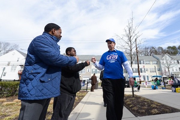 D.C. Mayor Vincent Gray speaks with constituents April 1, the day of the Democratic primary election. Gray faces seven candidates in his re-election bid.