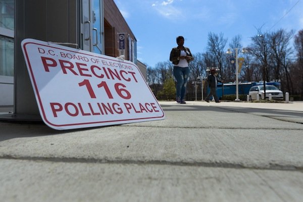 A woman approaches the 116th voting precinct in Southeast D.C. on April 1, the day of the city's Democratic primary election.