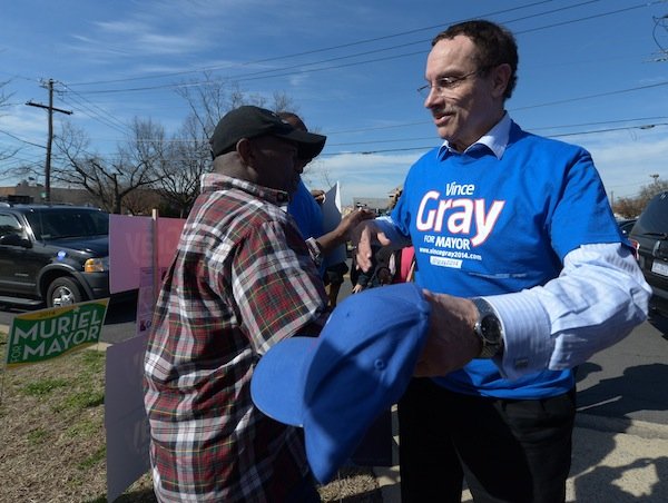 D.C. Mayor Vincent Gray speaks with constituents April 1, the day of the Democratic primary election. Gray faces seven candidates in his re-election bid.