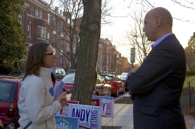 Early morning on DC Primary Election Day, Ward 1 Council candidate Brianne Nadeau chats with mayoral candidate Andy Shallal outside voting Precinct 25 at the Goodwill Baptist Church on Kalorama Road in Northwest. /Photo by Nancy Shia