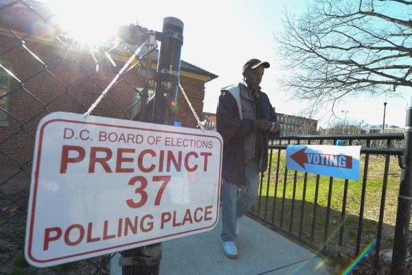 A voter leaves a polling precinct on Georgia Avenue in D.C. on April 1, the day of the city's Democratic primary.