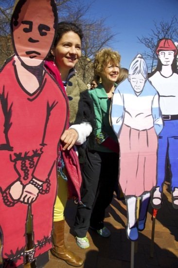 Frida Larios and Rev. Sharon Stanley-Rea, holding handmade figures to carry during an immigrant rights march in D.C., gathered for the start of the march at Lamont Park in Mount Pleasant NW on April 5, 2014.