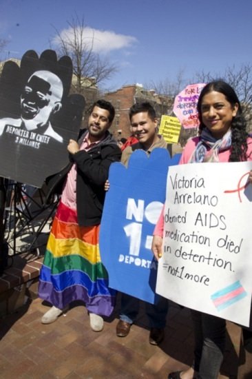Luis Ramirez, Cesar Vega and Isa Nayola participate in a rally and march in D.C. for immigrant rights in Lamont Park in Mount Pleasant, in support of members of the LGBT community who have been deported.