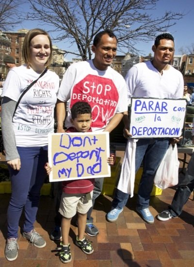 Immigrants Kirsten Wittkowski, 25, Federico Flores, 27, their son, Aiden, 6, and Federico's brother, Brian, 20, wait in D.C.'s Lamont Park in Mount Pleasant NW for an immigrant rights rally and march on April 5, 2014.