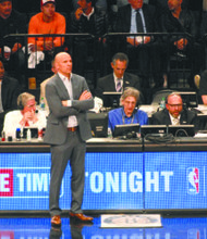 Former Brooklyn Nets coach Jason Kidd continues to be a backdoor specialist. Directly behind Kidd is (left) Billy King, the general manager whose job Kidd demanded.