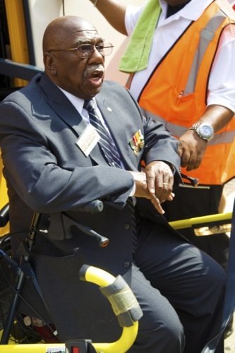 Freedom Rider Charles Person boards a bus for a June 2 ceremony at a U.S. Department of Education facility in Richmond, Virginia, to commemorate the 50th anniversary of the Civil Rights Act.