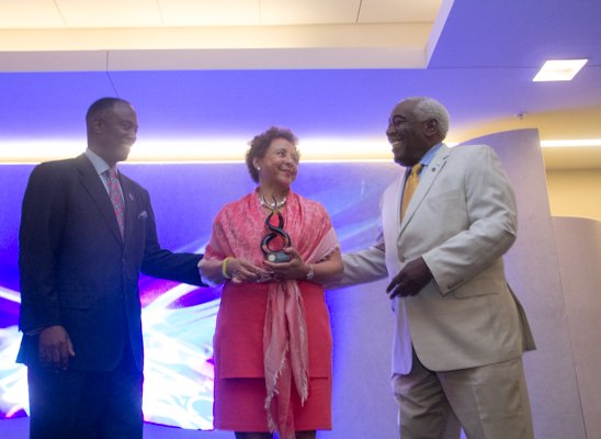 Ron Busby (left), U.S. Black Chambers, Inc. president & CEO and Aubrey Stone, chairman, president & CEO of the California Black Chamber of Commerce present an award to keynote speaker Sheila C. Johnson during the U.S. Black Chambers School of Chamber and Business Management luncheon held at the new Black-owned Marriott Marquis in Northwest on Thursday, July 10.