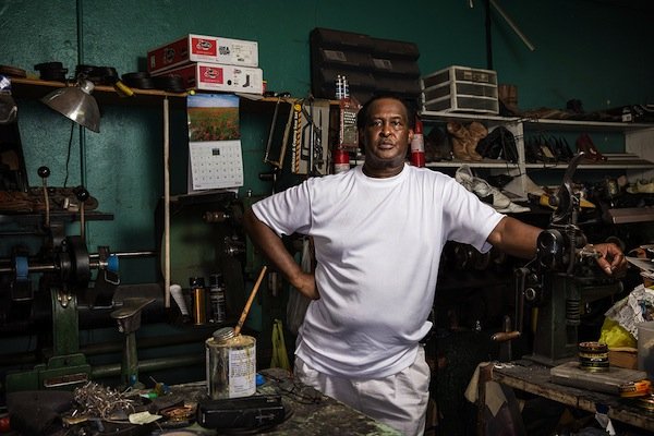 Dewitt Kimbley, 64, was born and raised in Greenwood, Miss., and runs a shoe repair business in the struggling downtown. (Edmund D. Fountain, special to ProPublica)