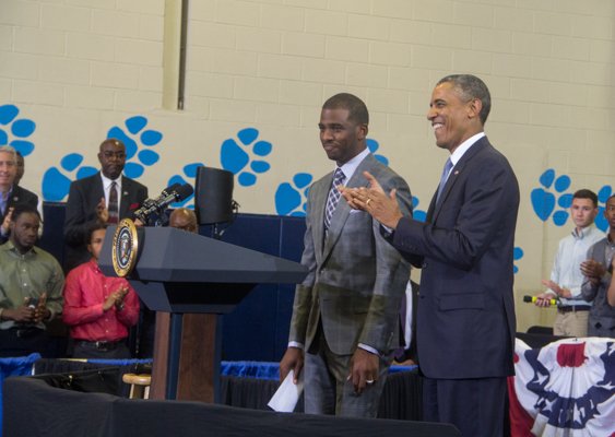 L.A. Clippers player Chris Paul introduces President Obama during the town hall for the White House's "My Brother's Keeper" initiative held at Walker Jones Education Center on Monday, July 21.