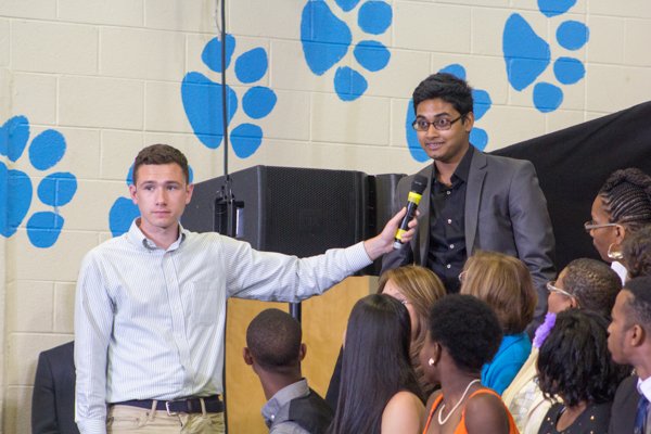 Audience member poses a D.C. Statehood question to President Obama during the town hall for the White House's "My Brother's Keeper" initiative held at Walker Jones Education Center on Monday, July 21.