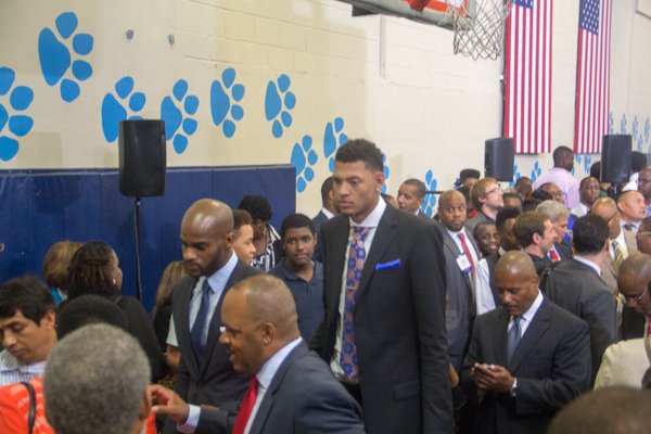 Isaiah Austin, who missed out on being drafted this year when he was diagnosed with Marfan Syndrome, attends the town hall for the White House's "My Brother's Keeper" initiative held at Walker Jones Education Center on Monday, July 21.