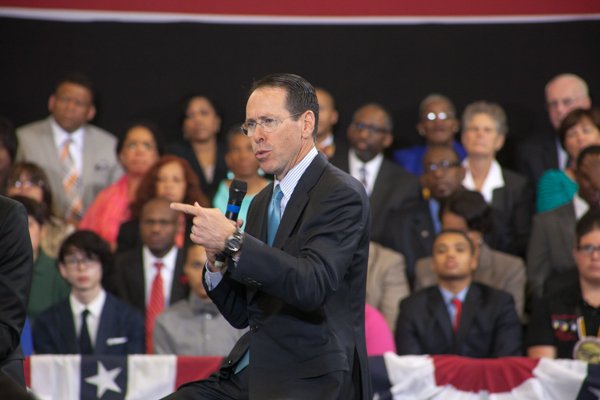 AT&T Chairman and CEO Randall Stephenson participates on a panel at the town hall for the White House's "My Brother's Keeper" initiative held at Walker Jones Education Center on Monday, July 21.