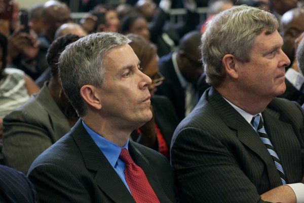 Education Secretary Arne Duncan attends the town hall for the White House's "My Brother's Keeper" initiative held at Walker Jones Education Center on Monday, July 21.