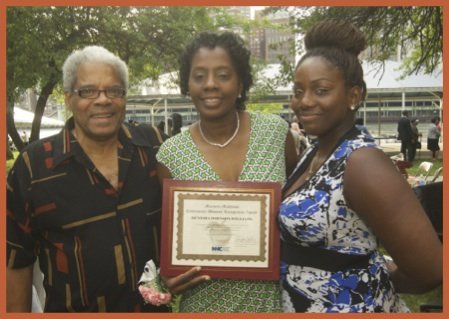 Paul Covington (RHCN CAB) and Denisha Johnson (RHCN CAB and Marjorie Matthews Community Advocate honoree), with daughter, Jasmin Bonilla