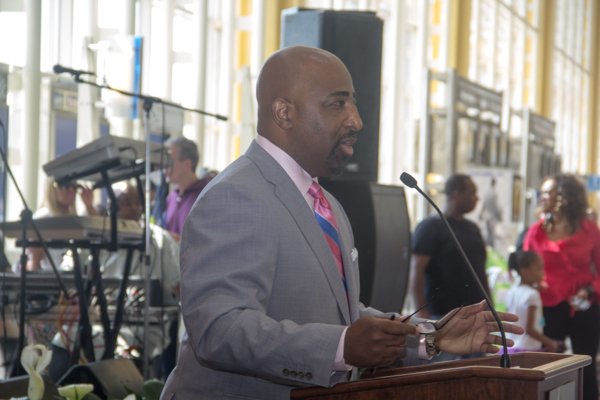 Marketplace Development's Regional Vice President, Clarence LeJeune, speaks during the opening ceremony of Bens' Chili Bowl's newest location at National Airport in Arlington, Va., on Wed., July 23. Marketplace Development manages all concessions at Reagan National Airport.