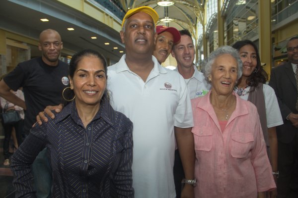 Ben's Chili Bowl family members at the opening of the restaurant's new location at National Airport in Arlington, Va., on Wed., July 23.