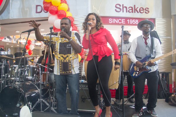 The Chuck Brown band performs during the opening of Ben's Chili Bowl's newest location at National Airport in Arlington, Va., on Wed., July 23.