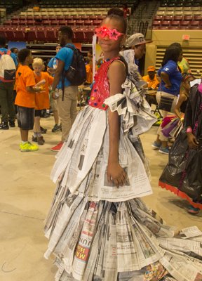 Najah Terrell prepares to walk the runway in her fashion design during the Trashion Fashion event at the Thingamajig Conference hosted by the YMCA of Metropolitan Washington at Show Place Arena in Upper Marlboro, Md., on Thurs., July 24.