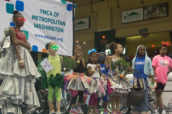 Children who designed the most outstanding fashions out of newspapers and other material had the opportunity to model their creations on stage during the Thingamajig Conference hosted by the YMCA of Metropolitan Washington at Show Place Arena in Upper Marlboro, Md., on Thurs., July 24.