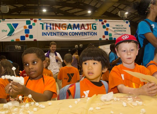 Mason Denson, Mitsuru Ishitara, and Jacob Mudd from the YMCA in Alexandria attend the Thingamajig Conference hosted by the YMCA of Metropolitan Washington at Show Place Arena in Upper Marlboro, Md., on Thurs., July 24.