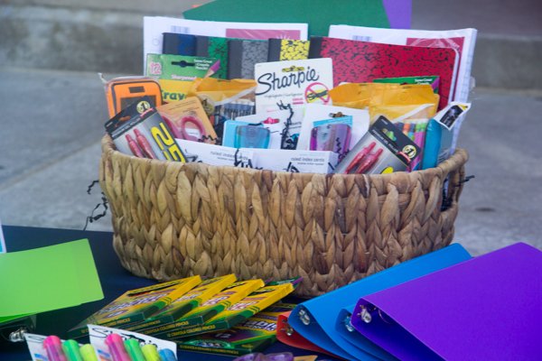 Table displaying Walmart donated classroom supplies during the company's designation of July 25 through 31 as Teacher Appreciation Week at Paul Public Charter School in Northwest on Monday, July 28.